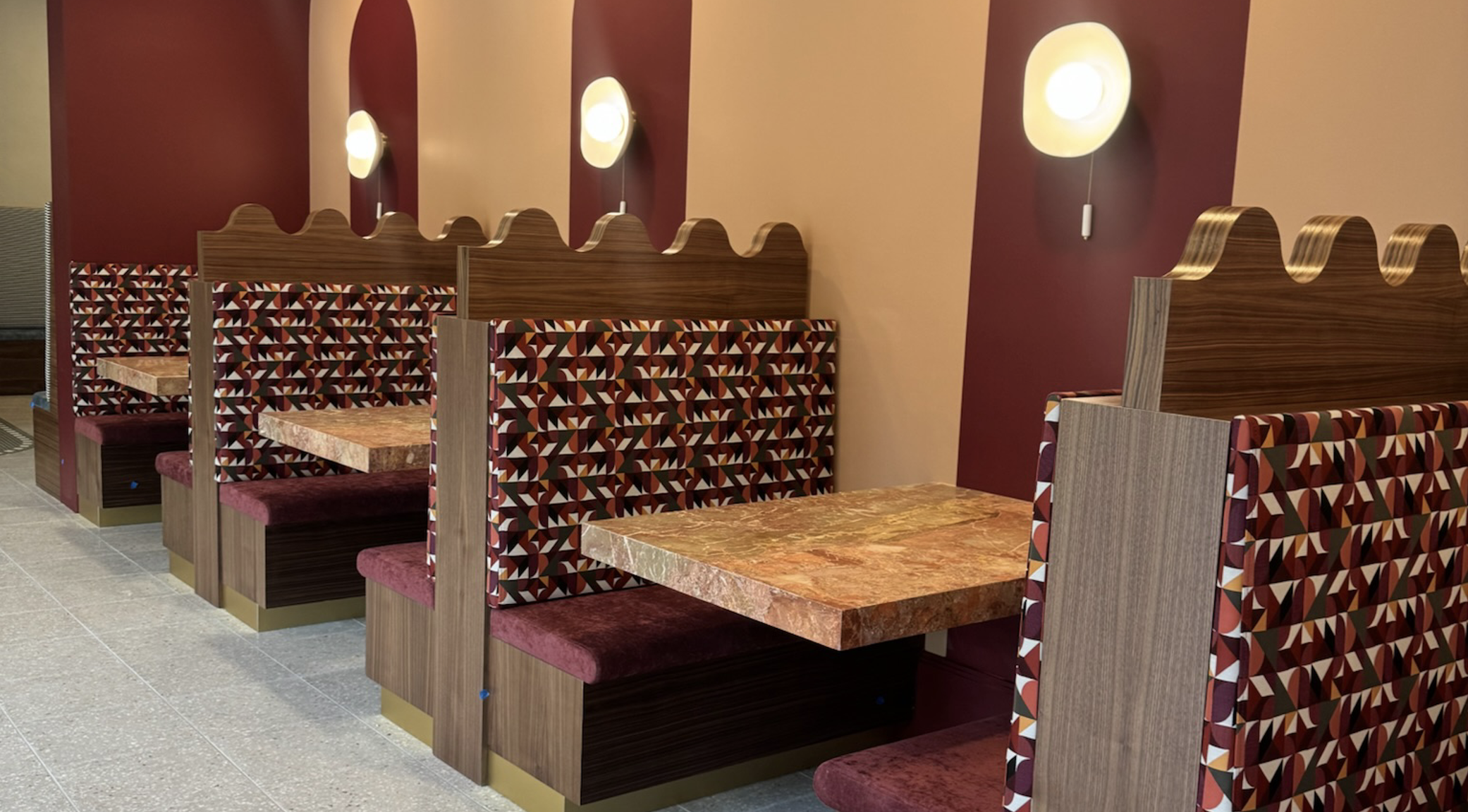 Booths inside Daydreamer at Rambler Atlanta. 